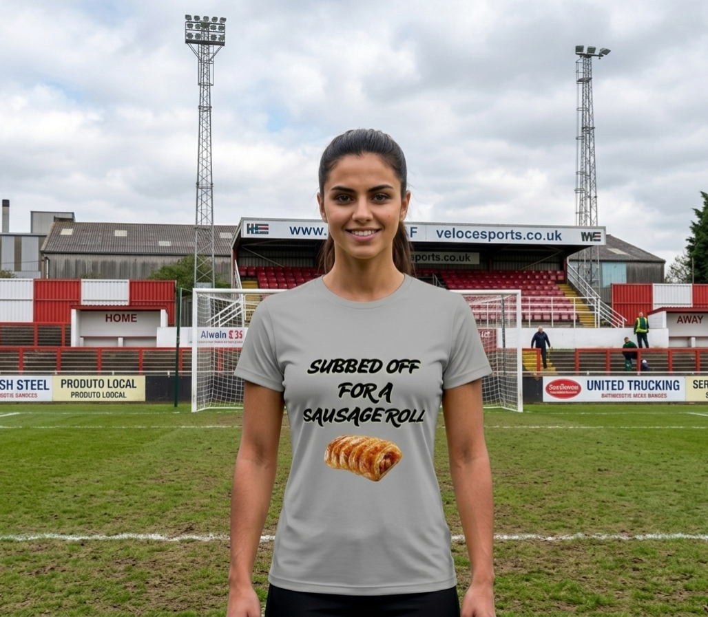 Young woman wearing Grey Veloce Sports banter shirt on a football pitch