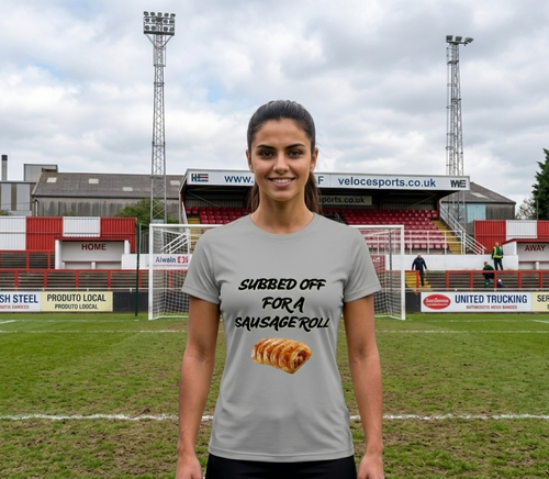 Young woman wearing Grey Veloce Sports banter shirt on a football pitch